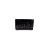 Chanel Embossed Camellia Patent Black
