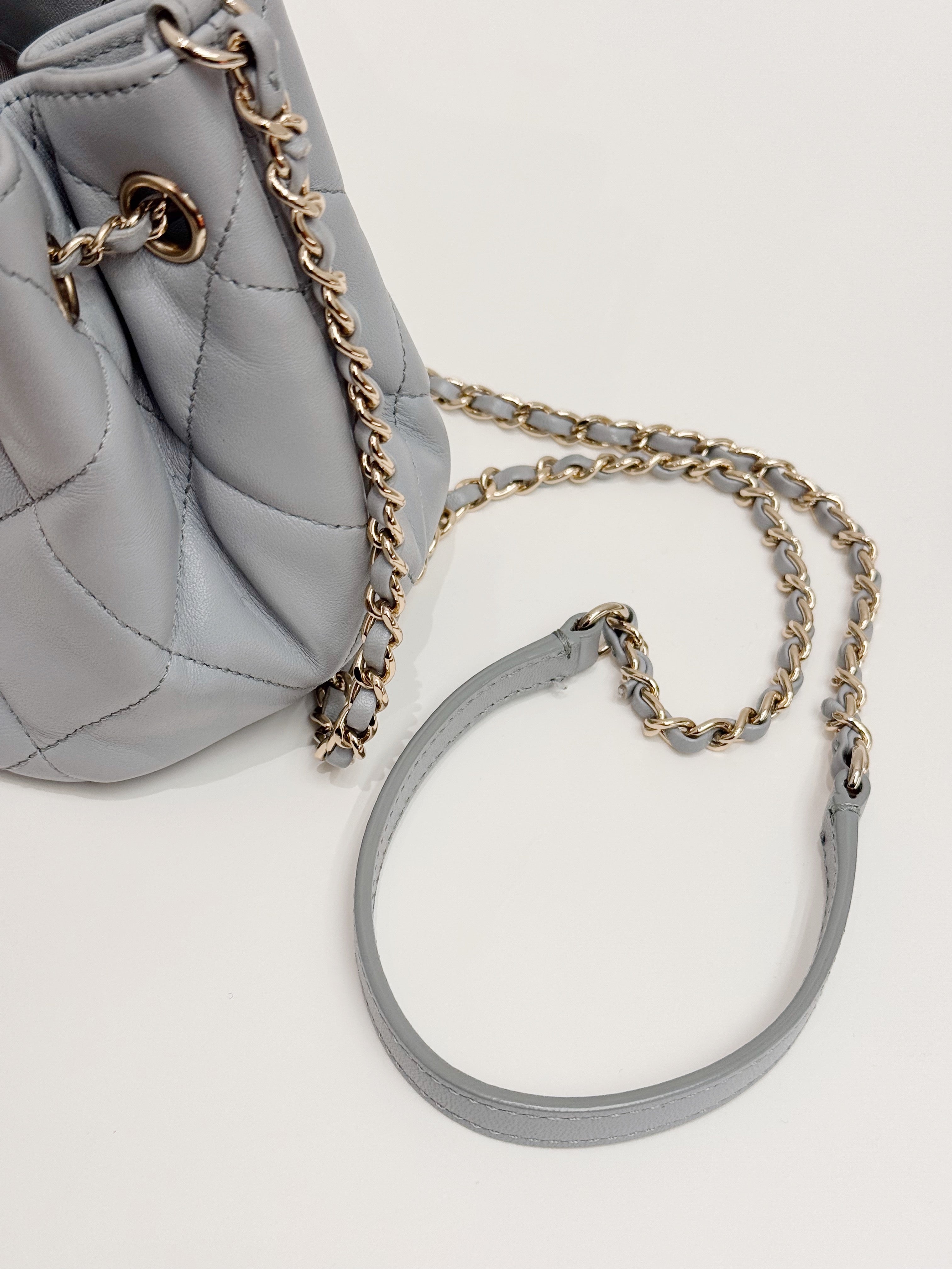 Chanel CC Dweller Drawstring Bucket Bag Lambskin Light Grey