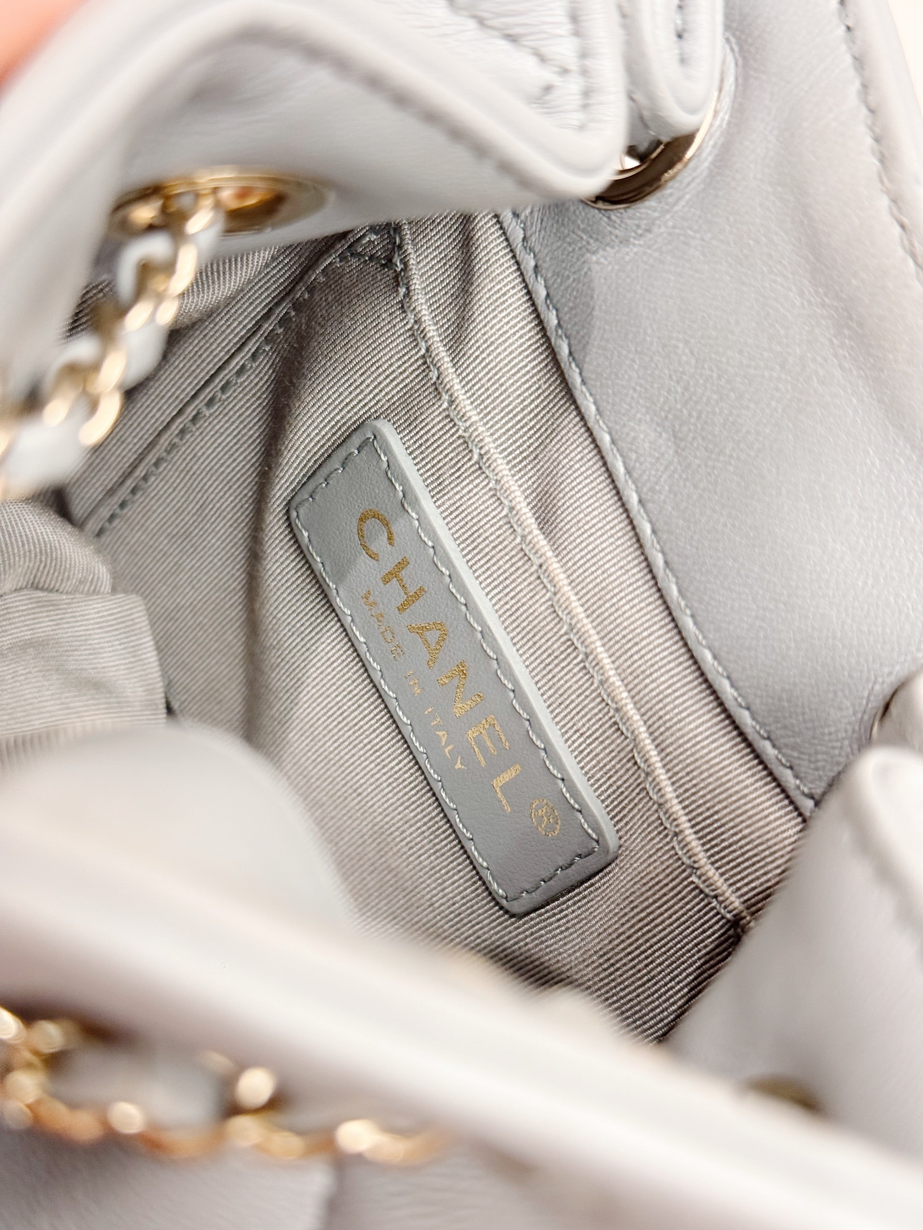 Chanel CC Dweller Drawstring Bucket Bag Lambskin Light Grey