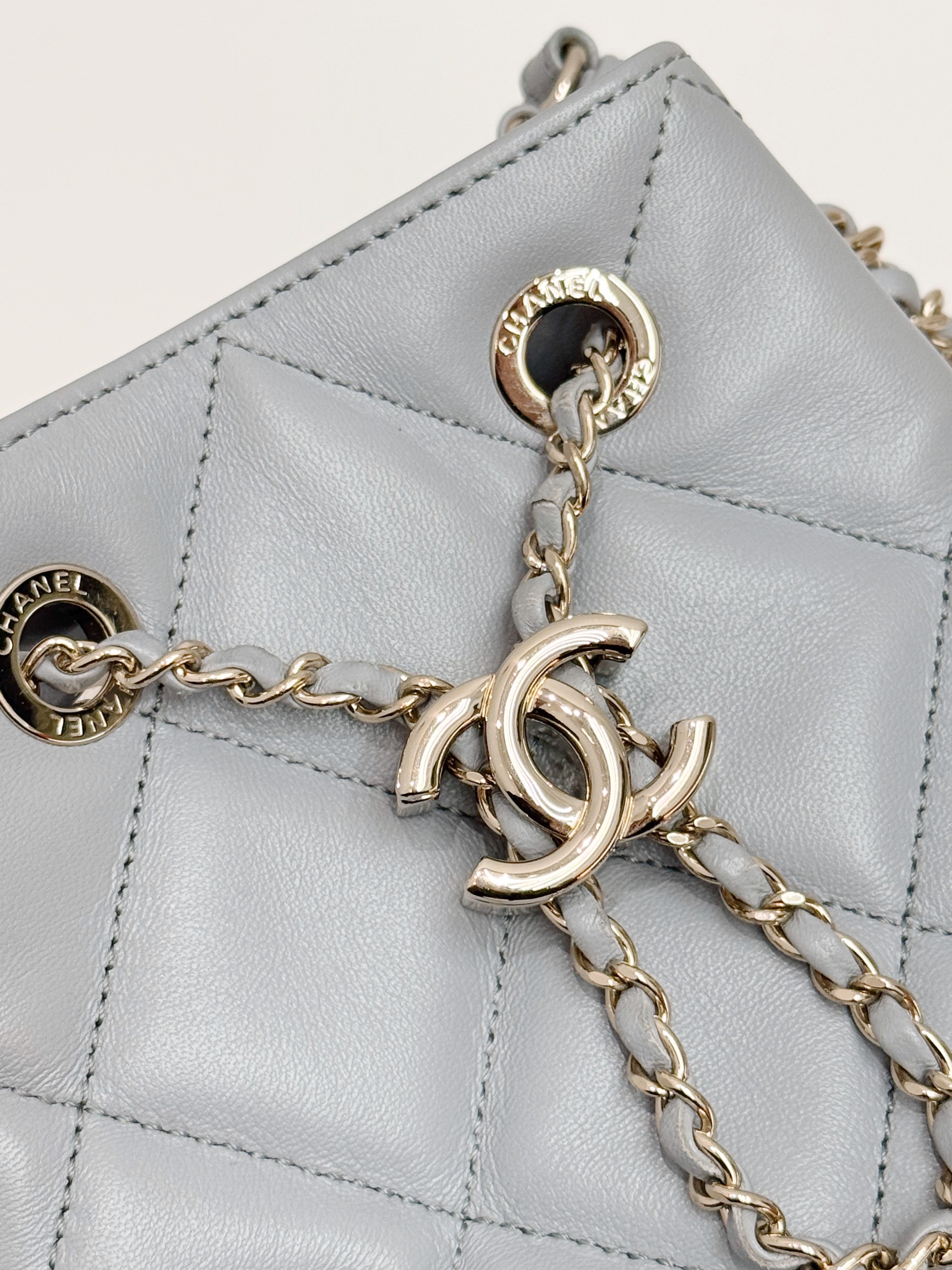 Chanel CC Dweller Drawstring Bucket Bag Lambskin Light Grey