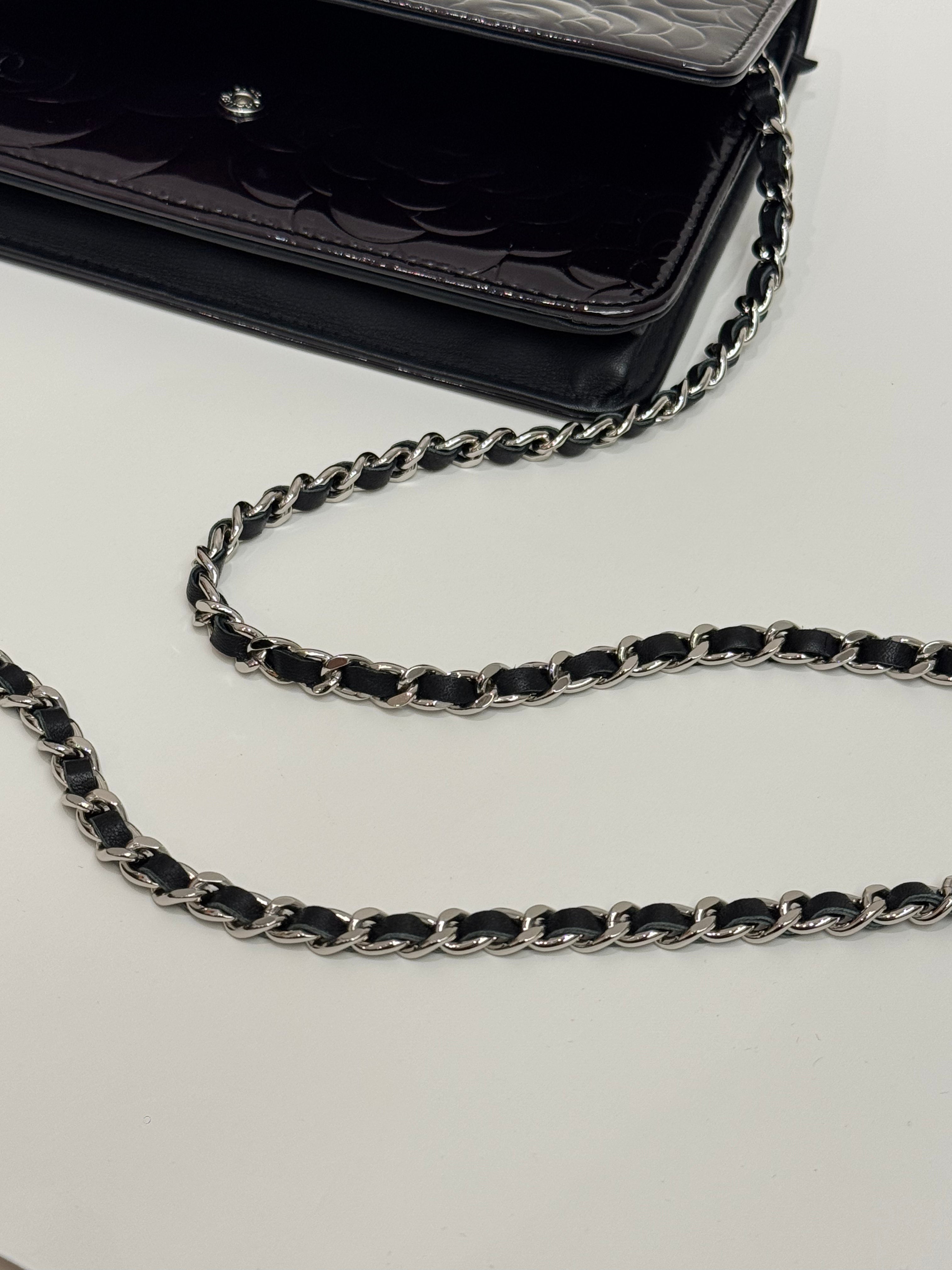 Chanel Embossed Camellia Patent Black
